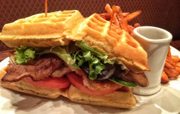 Rockit's tweet photo. You're not dreaming, this is real life. Crispy Fried Chicken &amp; Waffle Sandwich w/bacon and honey truffle maple syrup. http://t.co/NsnPrNvQeG