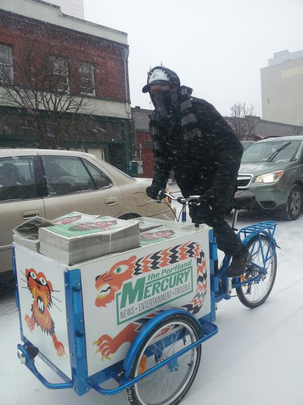 Cargo Bike Couriers out restocking <a href="/portlandmercury/">Portland Mercury 🗞</a> boxes in the snow. Rain, snow, nor sleet stops us! #pdxtst