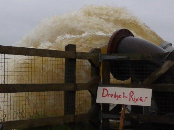 SomersetSG's tweet photo. #Somerset #Flood #Crisis "'Dredge The Rivers" signs made by locals are everywhere. http://t.co/vSdXTNt9jL