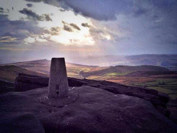 A stunning photo of the sun shining over Stanage Edge taken by <a href="/woodiesgob/">Annabel Wood</a>. Share your photos of Derbyshire with us