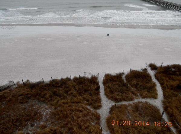 myrtlebeach's tweet photo. RT @jamiearnoldWMBF: SLEET accumulating on the sand in N Myrtle Beach from Colman Racey. #WMBFSnow http://t.co/zpH2W4quma