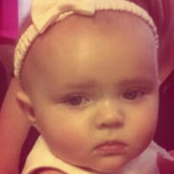 damestreet's tweet photo. Amelia at her christening xjx http://t.co/lw4gzjCheY