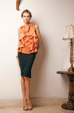 ZoeClothing's tweet photo. ZOE's Symmetrical Ruffles Top (avail in Orange&amp;Grey),now on sale for Rp 149.950! Get them @SOGO_IND &amp; @centroholic http://t.co/cXwH9Mtx9T