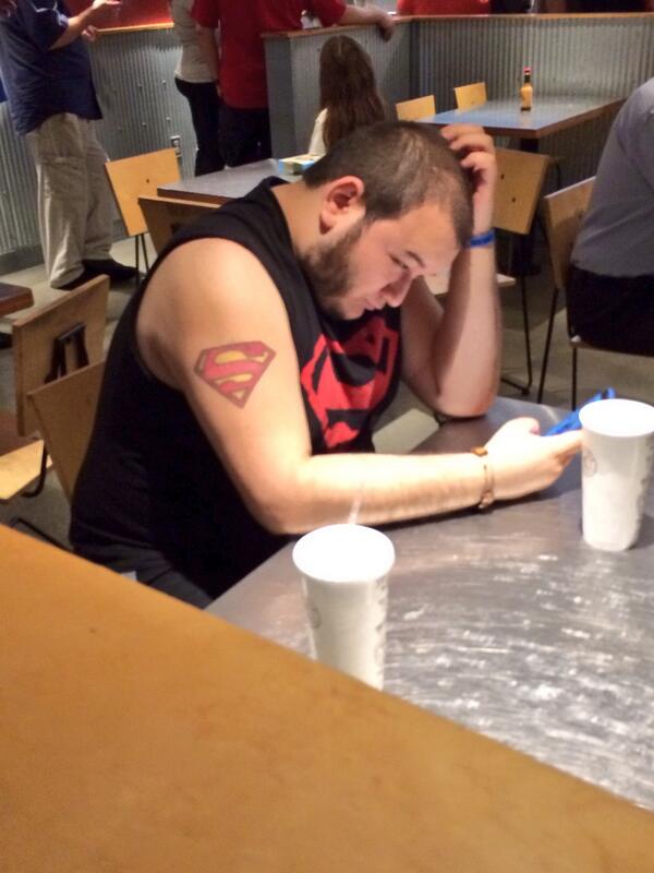 geniebouchard's tweet photo. Guy at Chipotle wearing a Superman shirt with a matching Superman tattoo #calmdownbro http://t.co/mzaHgwOPcJ