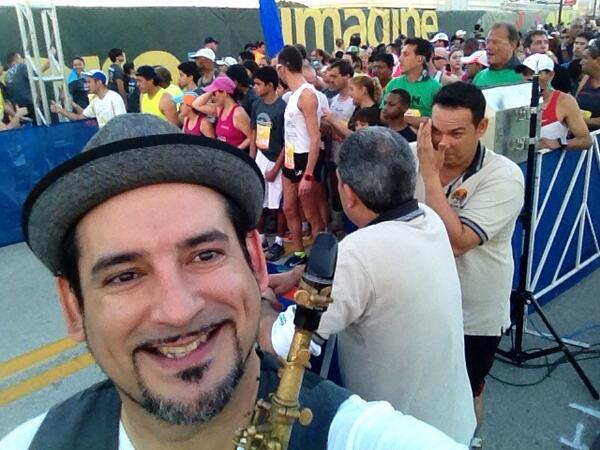 JUANTURROS's tweet photo. @SUENALO 's own JT Smoove plying the National Anthem at the Tropical 5K run. http://t.co/kHgtBQjNXd