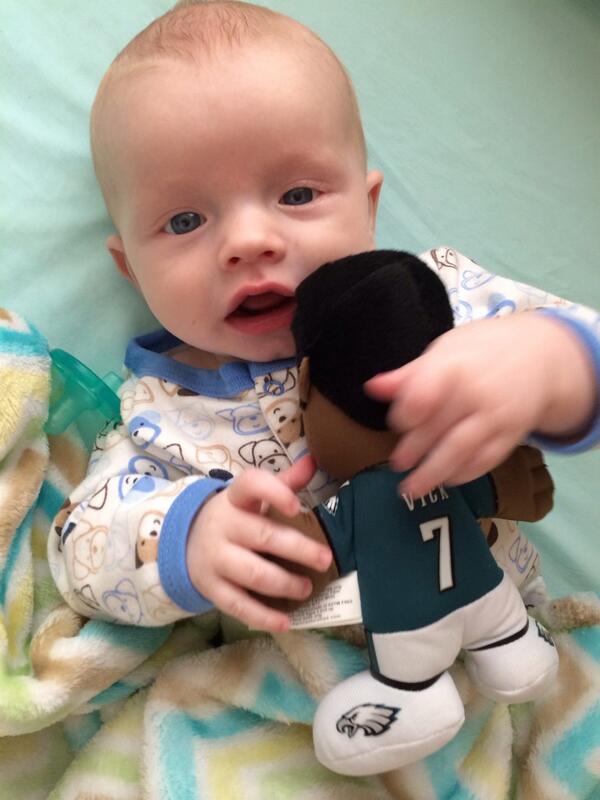 dr4master's tweet image. Who needs a teddy bear when you have a stuffed @MikeVick raising him right! #flyeaglesfly