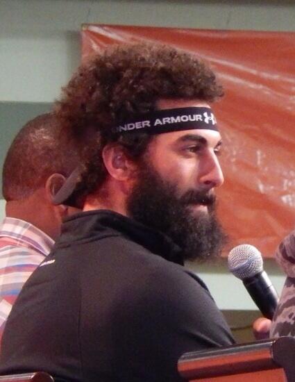 Eduardo A. Encina on X: #Orioles RF Nick Markakis' look at FanFest.  Well-grown hair and beard and backward visor.  / X