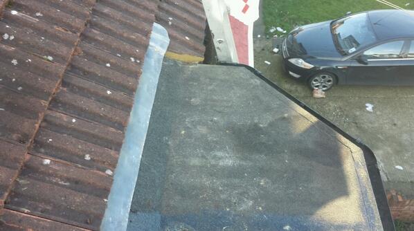 New lead flashing as coverage was only 10mm and leaking under 1st course of tiles.1st course bedded down with mortar.