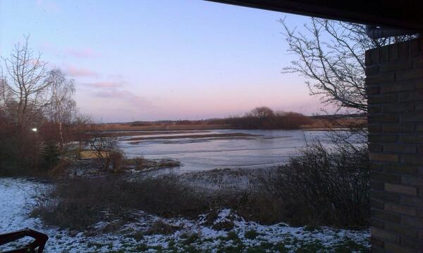 Skagitanglers's tweet photo. Sunset view from my new house. Winter flooding River Ribe å in the back. #salmon will run in few week. Life is good! http://t.co/FJq7enSb0P