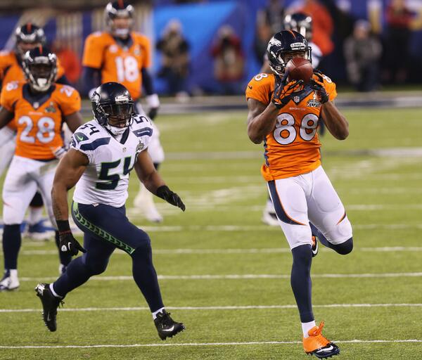 SportsCenter's tweet photo. Demaryius Thomas catches the TD pass from Peyton Manning. Thomas has a Super Bowl record 12 catches. #SB48 http://t.co/Q0dvszrjVf