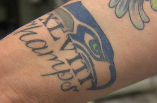 SportsCenter's tweet photo. A Seahawks fan got this tattoo BEFORE the season.
He's not really sweating it now. #SB48 http://t.co/SgO28pupXf