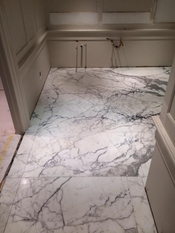 felixtiling's tweet image. Book matched marble in residential bathroom, Sackville St London