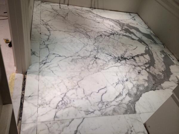 felixtiling's tweet image. Book matched marble in residential bathroom, Sackville St London