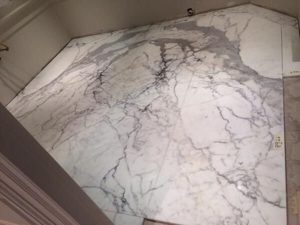 felixtiling's tweet image. Book matched marble in residential bathroom, Sackville St London