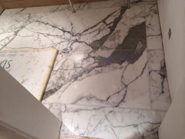felixtiling's tweet image. Book matched marble in residential house shower floor , Sackville St London