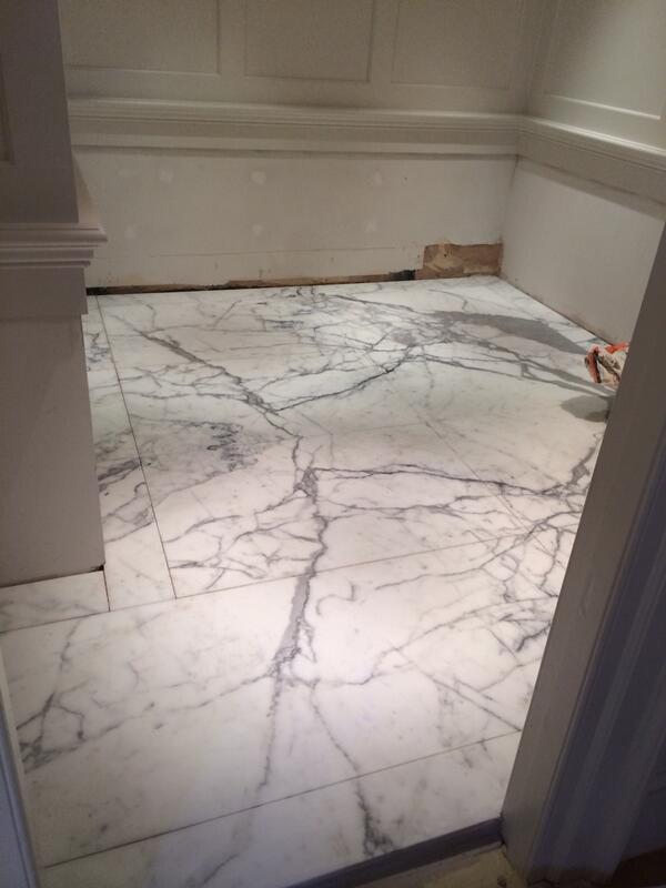 felixtiling's tweet image. Book matched marble in residential bathroom floor, Sackville St London
