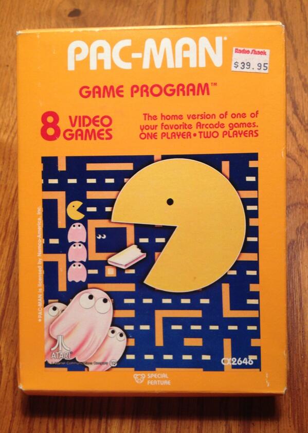 NeatoCoolville's tweet photo. I still have my Atari 2600 Pac-Man that I bought from @RadioShack back in the 80s. #PacTable http://t.co/zPhF2PsqyV