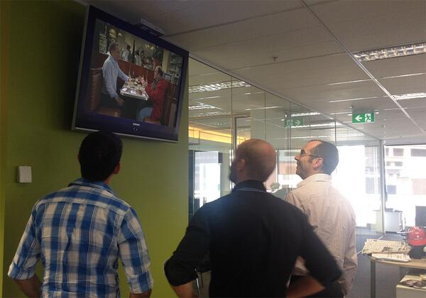 toowards's tweet photo. The power of GOOD advertising: the office stops to watch the Super Bowl AD BREAK! http://t.co/LjYGMT1x5H