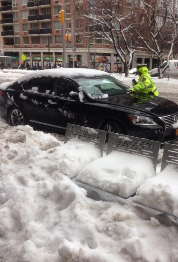 billritter7's tweet photo. No plows. No subway. But NYC cops writing parking tickets in the snow. Only in ny. @abc7ny http://t.co/ufts1eRH5y
