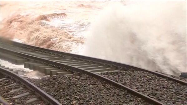 bbcweather's tweet image. Incredible picture of the ground under the railway track washed away in #Dawlish LH #ukstorm