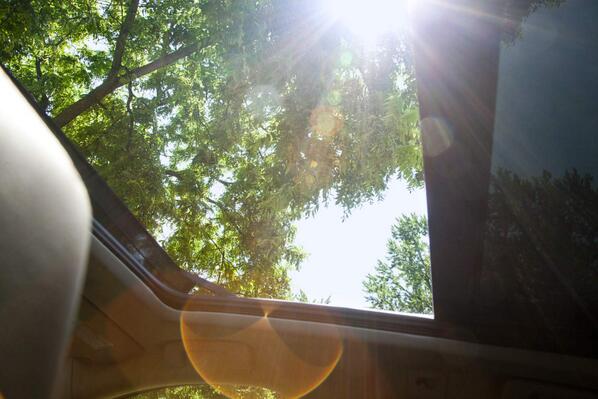 Cadillac's tweet image. #EnoughAlready—dreaming of summer days and the UltraView sunroof in the 2014 #SRX. bit.ly/1fEz400