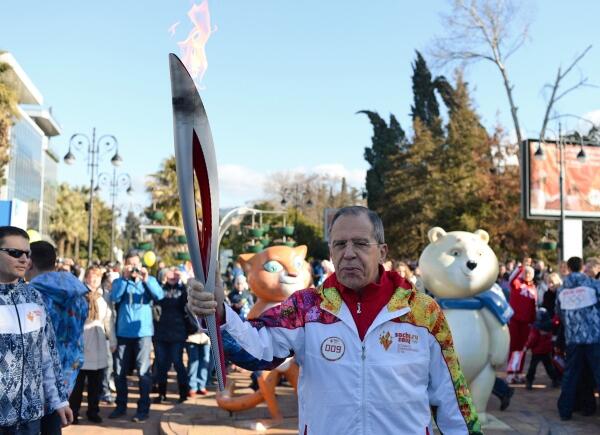 mfa_russia's tweet photo. Russian Foreign Minister Sergey #Lavrov carried the Olympic flame @Sochi2014 @mediacenter_en @mfa_russia http://t.co/1rO6r1VDnh