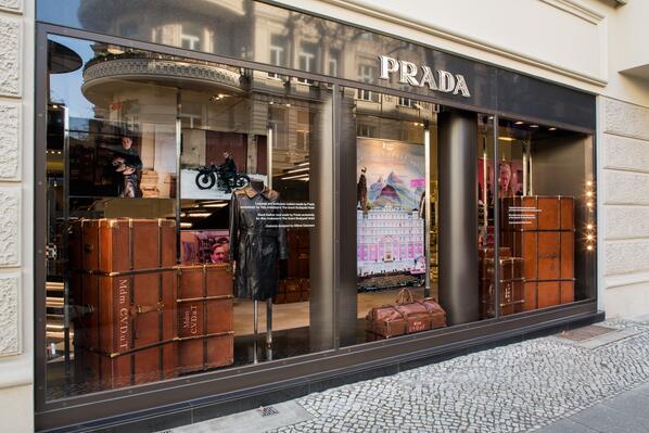 Prada's tweet photo. Preview the #Prada #Berlin store special display dedicated to #WesAnderson’s #TheGrandBudapestHotel http://t.co/D9j6Q46UOt