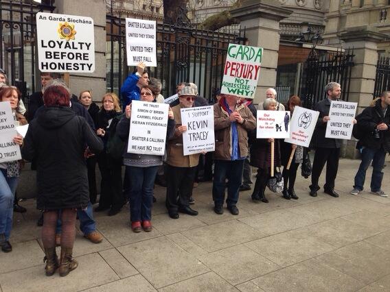 oconnellhugh's tweet image. Protesters outside Leinster House including ex Garda John Wilson calling for Shatter to resign #GSOC
