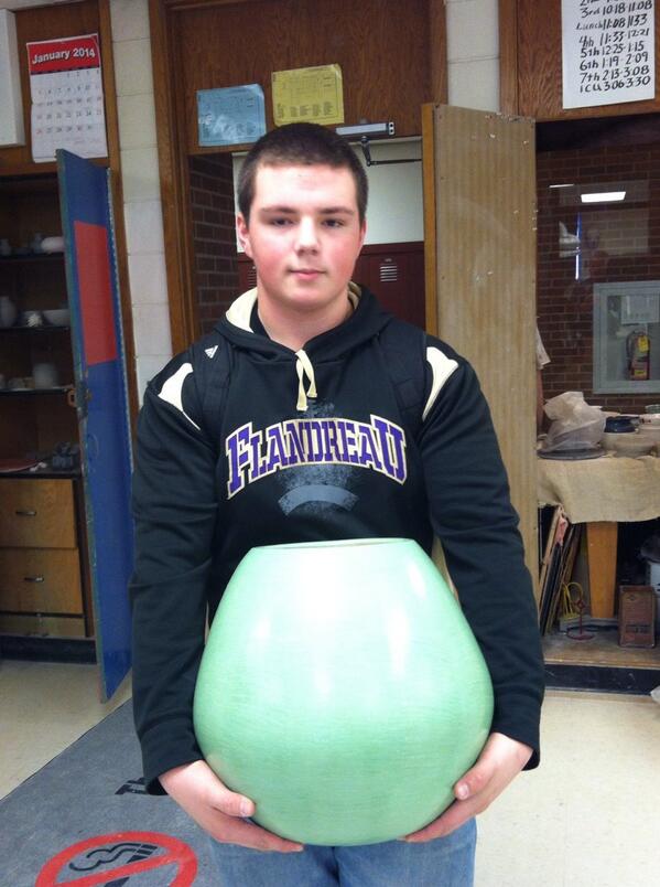 Logan with his coil pot.