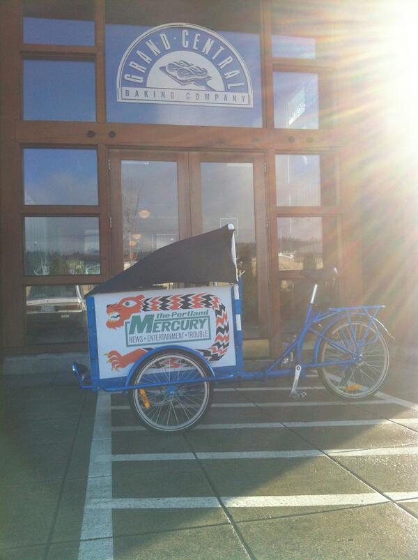The <a href="/portlandmercury/">Portland Mercury 🗞</a> Cargo Bike Courier delivers the fresh paper at daybreak for <a href="/grandcentralpdx/">Grand Central Bakery</a> !