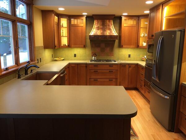 Here's a beautiful Craftsman style kitchen designed by Yuli. QS Oak <a href="/MedallionCab/">Medallion Cabinetry</a>, concrete tops, &amp; copper accents.