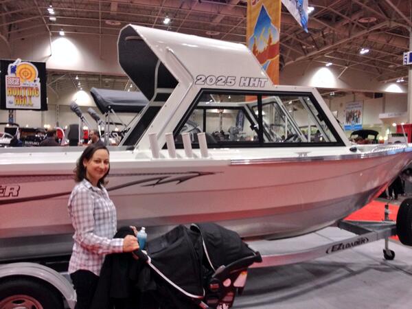 ddominck's tweet photo. My wife next to a nice @Kingfisherboats at the @CNSSToronto show i http://t.co/z25tqs0pOb