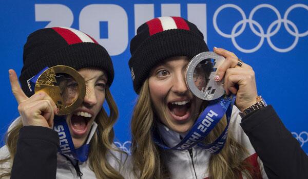 globeandmail's tweet photo. How to pose with a medal, pirate style, by the Dufour-Lapointe sisters: http://t.co/BcEdPB3q7b http://t.co/i8ja8qnLXE