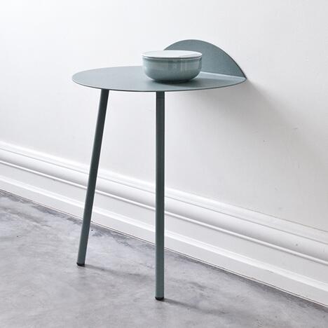 dezeen's tweet photo. Two-legged side table that rests against the wall: http://t.co/xGn3I5zstt #2014sff #design http://t.co/Tuwq90MzUw