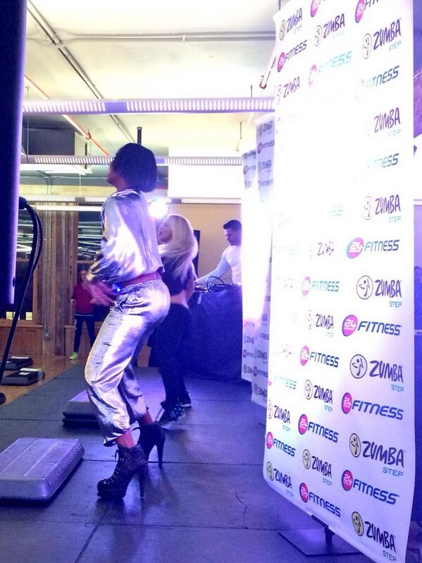 Latina's tweet photo. Look at her go! That's @KELLYROWLAND warming up for the #Step25 @Zumba class in GIANT high heels! #fierce http://t.co/PA6WYU6YVp