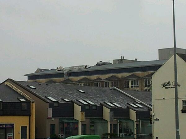 donnolann's tweet photo. Large part of roof of The Brandon Hotel in Tralee ripped off in devastating storm http://t.co/HhqvR3rcRf