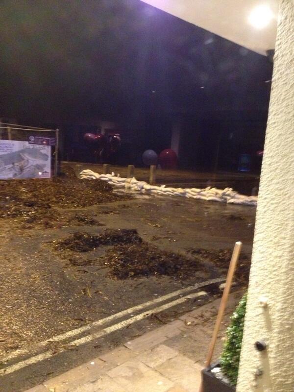 ShellBayMarine's tweet photo. Swanage lower high street preparing for high waters tonight. http://t.co/R3yWbdXS0o