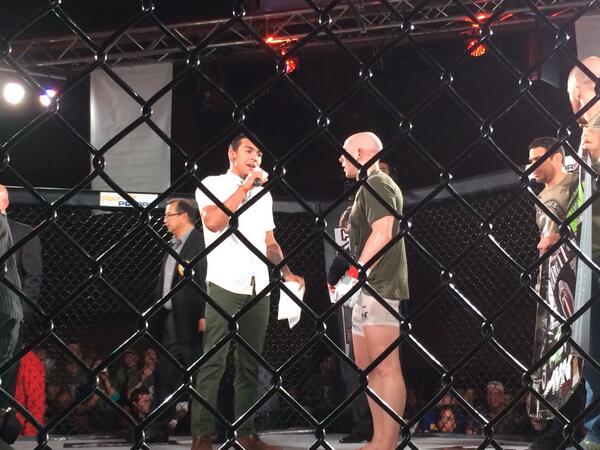 WFC_MMA's tweet photo. #WFC8 @TouchyFili talks to @JoshEmmett145 after a great W in a fight of the night contender #MMA http://t.co/i9h0ZLZkrQ