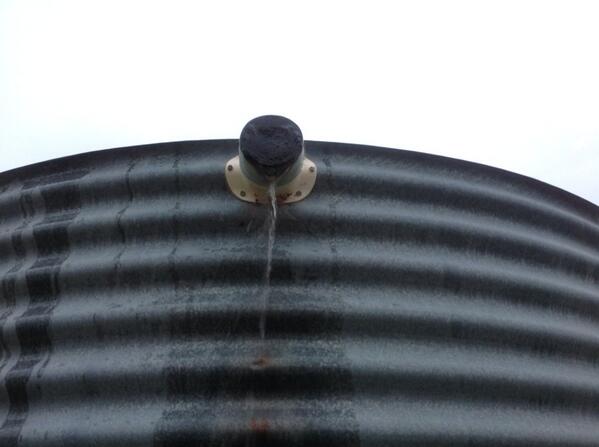 endofthebitumen's tweet photo. Nuthin' says happy days in the bush like an overflowing water  tank - go you good things http://t.co/bvRSMDiUia