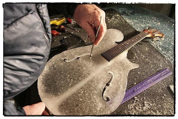 EnglishEccent's tweet photo. #TimLinhart carves faithful reproductions of all his stringed instruments out of #ice for his band.. #IceMusic http://t.co/me2qFtUGoG