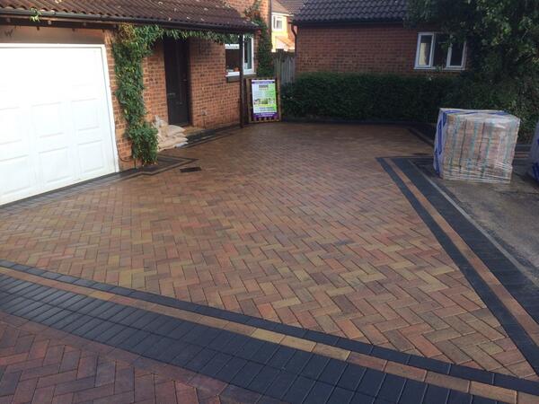 Bradstone standard paving with charcoal border autumn inlay