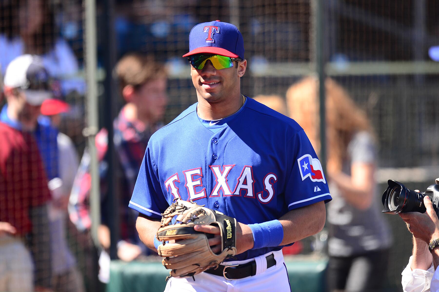 SportsCenter on X: Russell Wilson was drafted by 3 MLB teams, including  Texas. Today, he donned the Rangers uniform in spring training.   / X