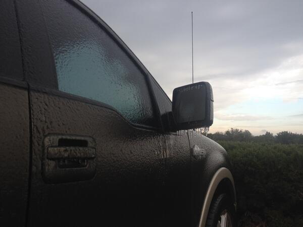 Freezing rain and sirens in the distance drive careful people.