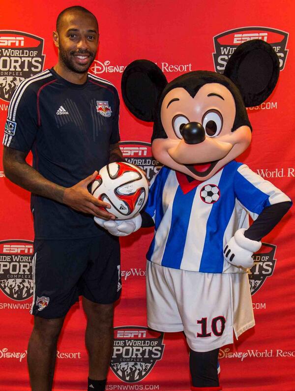 ESPNWWOS's tweet photo. Last week @NewYorkRedBulls striker Thierry Henry struck a pose with Mickey Mouse at the #ESPNWWOS during #DisneyPSC. http://t.co/5hQK1D8OVU