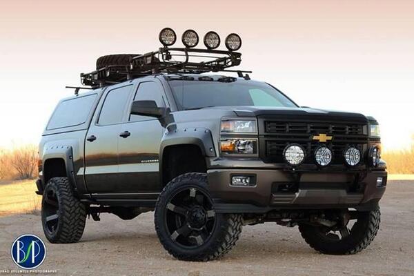 selectoffroad's tweet photo. Flashback Friday @SEMASHOW @BryantBuilt #completecustoms #lifted #chevy #sema13 #leerbooth http://t.co/tzw9HFxfcs