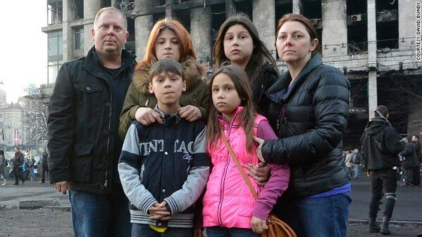 cnnbrk's tweet image. Alabama couple goes into Ukraine unrest to adopt 4 Ukrainian children. cnn.it/1l7zZuL