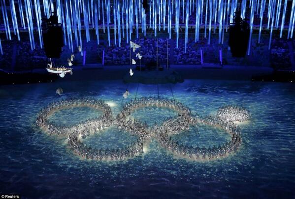 DailyMail's tweet photo. Closing ceremony mocks opening of Winter Olympics ring failure http://t.co/nj0k3b7hev http://t.co/ArTag4qOxe