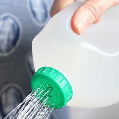 HouseholdTip's tweet photo. Old milk jug?  A few hole and now you've got a recycled water can! #gogreen #green http://t.co/428rNyeGvc