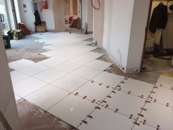 NJRWorkspace's tweet image. Laying Porcelain floor tiles by NJR coolspace