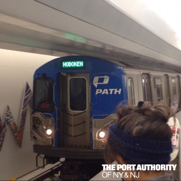 PATHTrain's tweet image. Photo of first HOB-WTC train arriving on #PATHTrain #WTC Station Platform A, which is now fully open and operational.